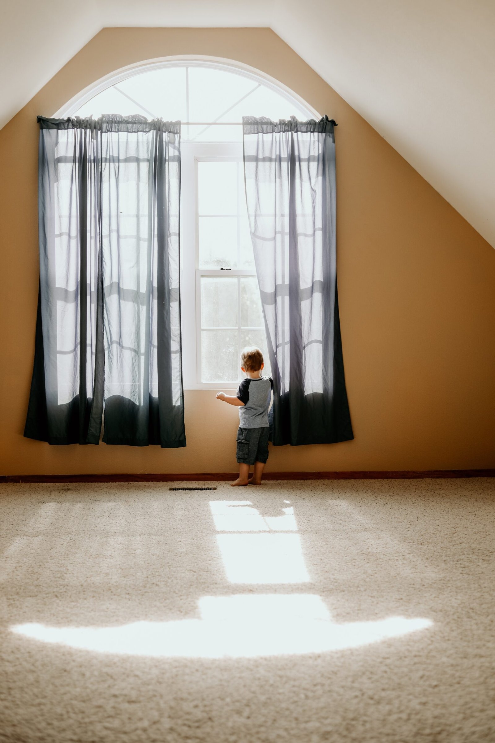 a child looking out of a window