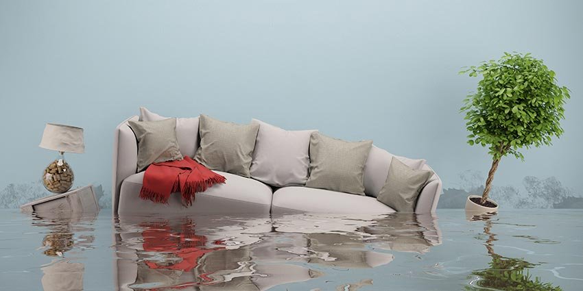 sofa that is floating away due to water