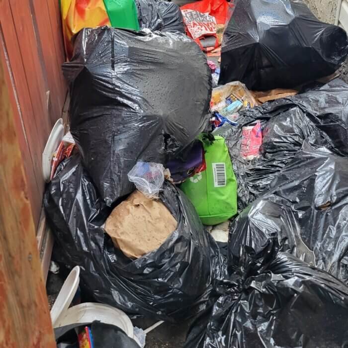 Tenant damaged left garbage on side of home causing an infestation