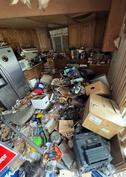 Hording in a kitchen before removal and biohazard cleaning. disinfection and odor removal
